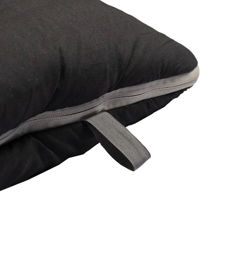 Black camping pillow with gray strap for outdoor adventures
