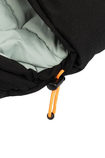 Black sleeping bag with orange drawstring and light green interior lining