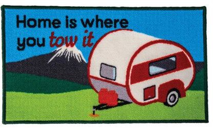 Patch with a camper and text 'Home is where you tow it' on a blue background