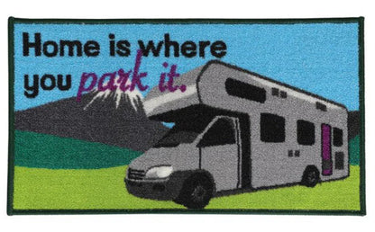 Patch with an RV and text 'Home is where you park it.' on a blue and green background