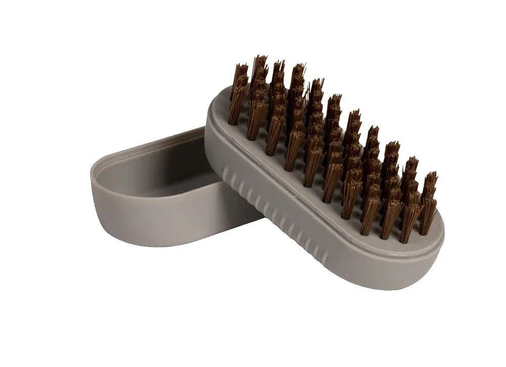 Gray brush with brown bristles and matching storage case for outdoor gear cleaning